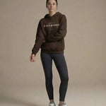 Model wearing Last Rodeo Hoodie