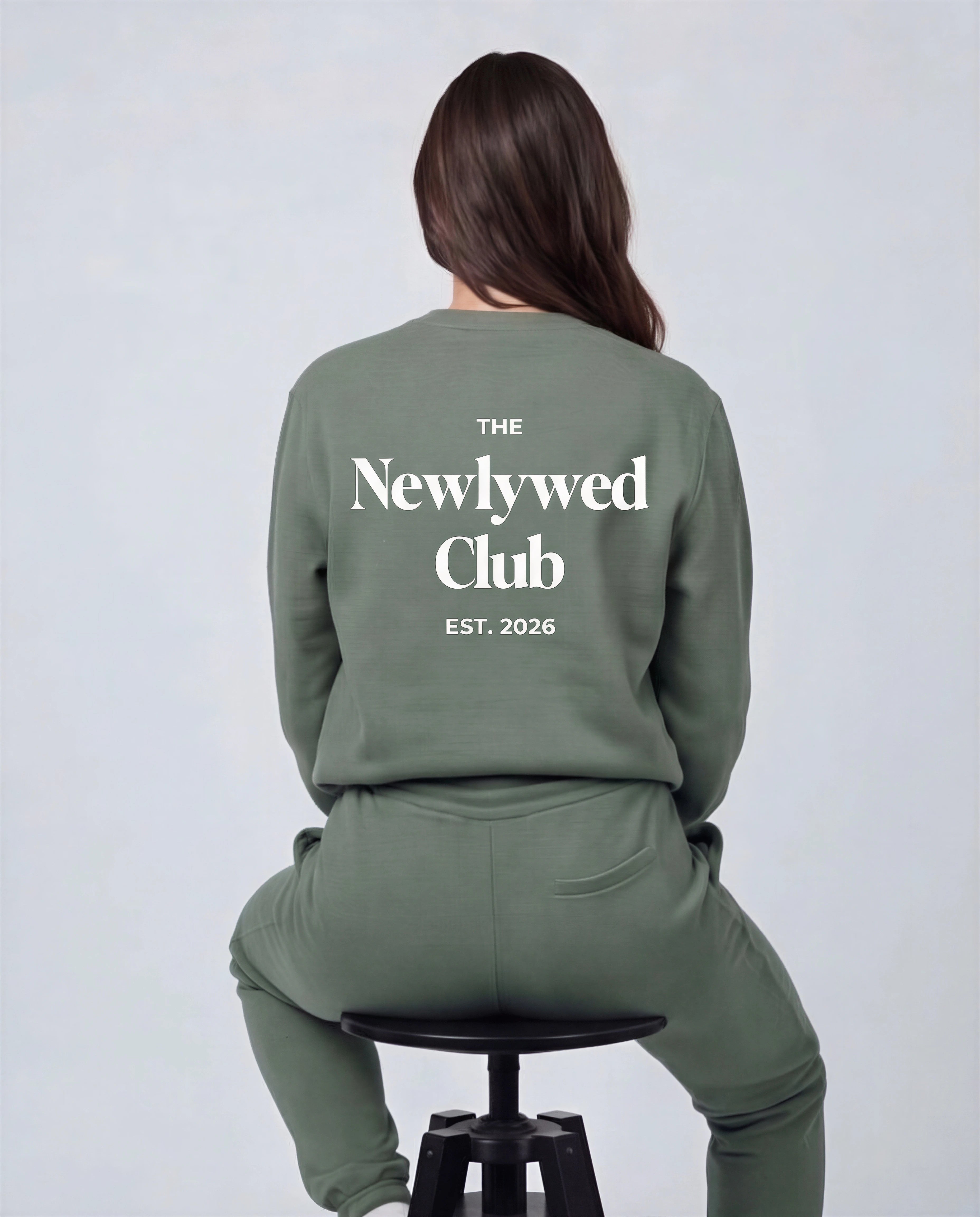 Model wearing Newlywed Club Crew Neck Sweatshirt - Alpine Green