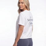 Model wearing Newlywed Club T-Shirt - Slate Blue Logo