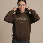 Model wearing Last Rodeo Hoodie