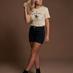 Model wearing Last Rodeo T-Shirt